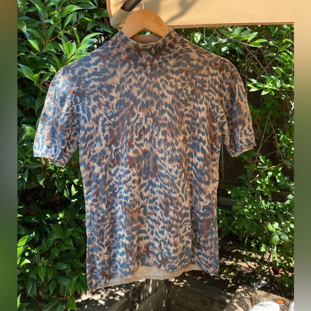 Animal print silk mock neck